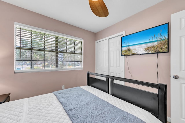 bedroom featuring a closet and ceiling fan