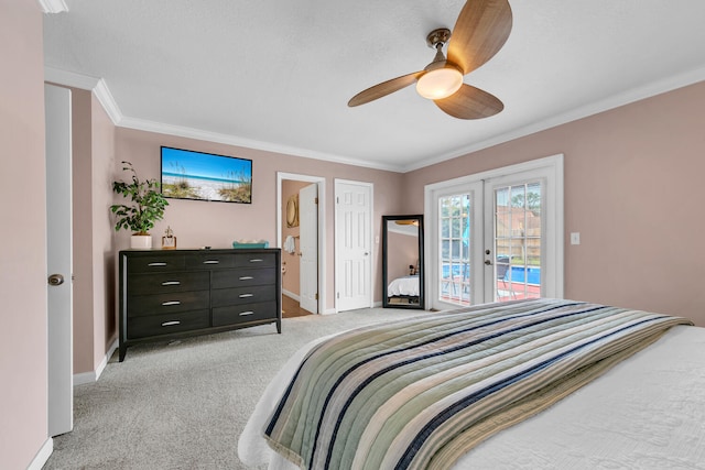 bedroom featuring ensuite bathroom, crown molding, baseboards, access to outside, and light carpet