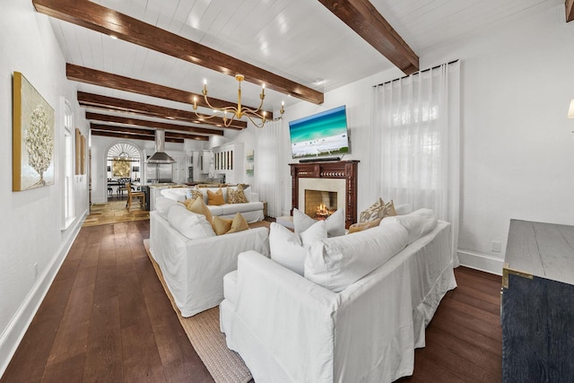 122 W Kingston Rd, Rosemary Beach, FL 32461 - living room featuring hardwood / wood-style flooring, a chandelier, a high end fireplace, baseboards, and beamed ceiling