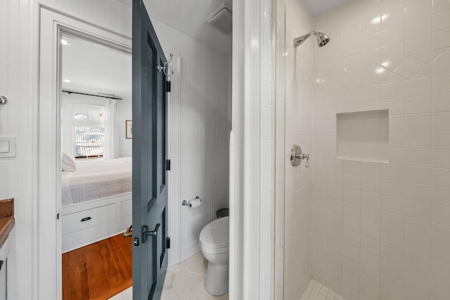 122 W Kingston Rd, Rosemary Beach, FL 32461 - bathroom with ensuite bathroom, visible vents, toilet, a stall shower, and tile patterned flooring