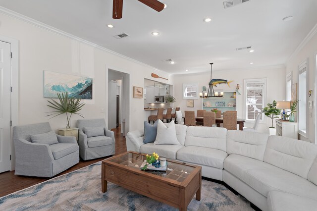 68 N Ryan St, Santa Rosa Beach, FL 32459 - living area with ceiling fan, visible vents, crown molding, and wood finished floors