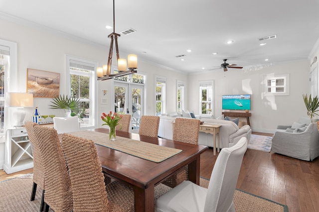 68 N Ryan St, Santa Rosa Beach, FL 32459 - dining area with a wealth of natural light, visible vents, and ornamental molding