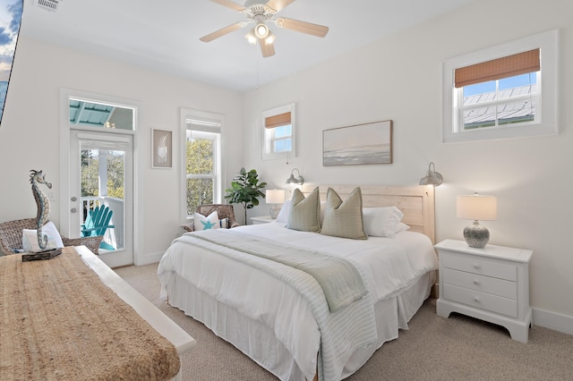 68 N Ryan St, Santa Rosa Beach, FL 32459 - bedroom featuring visible vents, baseboards, ceiling fan, access to exterior, and light colored carpet