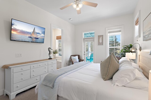 68 N Ryan St, Santa Rosa Beach, FL 32459 - carpeted bedroom with visible vents, access to outside, multiple windows, and a ceiling fan