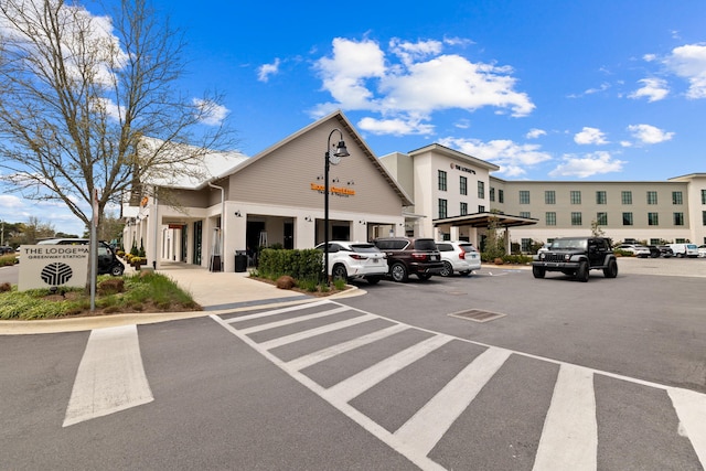 68 N Ryan St, Santa Rosa Beach, FL 32459 - view of building exterior with uncovered parking