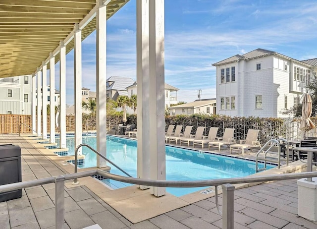 68 N Ryan St, Santa Rosa Beach, FL 32459 - community pool with fence, a residential view, and a patio