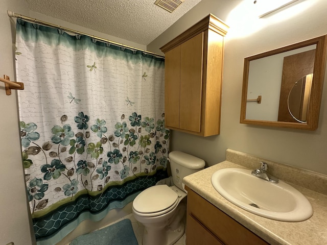 bathroom with vanity, shower / bath combination with curtain, toilet, visible vents, and a textured ceiling