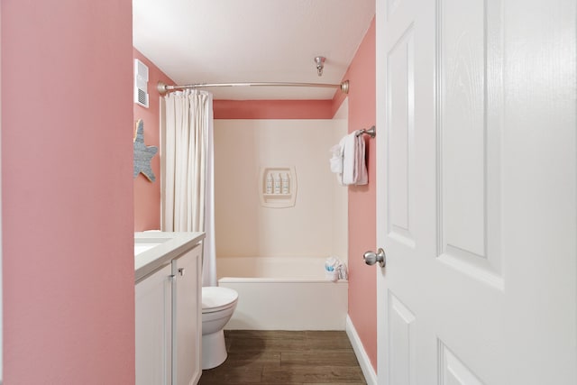 790 Santa Rosa Blvd Unit 403, Fort Walton Beach, FL 32548 - full bathroom featuring shower / bath combo, visible vents, toilet, wood finished floors, and vanity