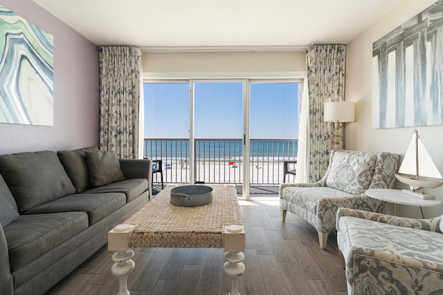 790 Santa Rosa Blvd Unit 403, Fort Walton Beach, FL 32548 - living room featuring a water view, wood finished floors, and a view of the beach