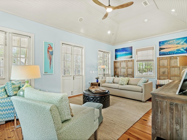 living room featuring visible vents, a ceiling fan, wood ceiling, wood finished floors, and vaulted ceiling