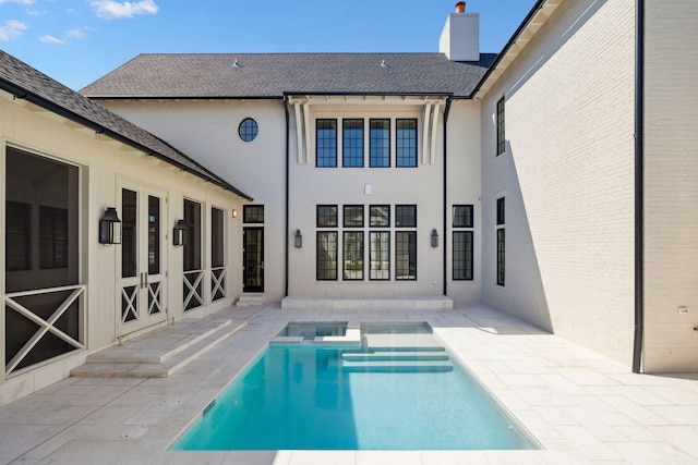 342 Windsong Dr, Inlet Beach, FL 32461 - view of pool with a pool with connected hot tub and a patio area