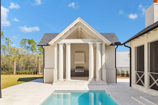 342 Windsong Dr, Inlet Beach, FL 32461 - exterior space with an outdoor kitchen, a shingled roof, fence, and a patio area