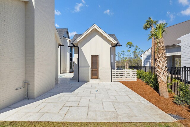 342 Windsong Dr, Inlet Beach, FL 32461 - view of patio / terrace featuring an outdoor structure and fence