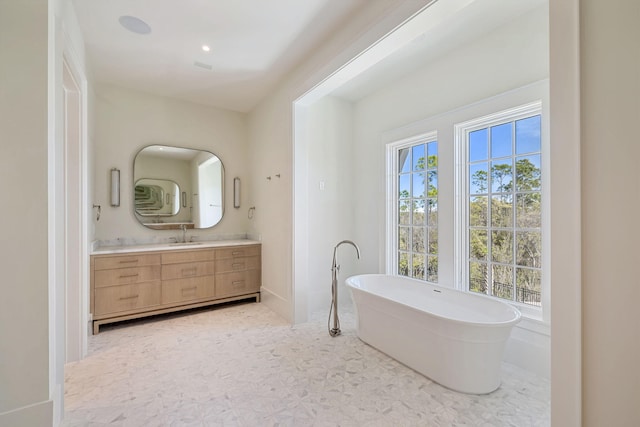 342 Windsong Dr, Inlet Beach, FL 32461 - full bathroom with a freestanding tub and vanity