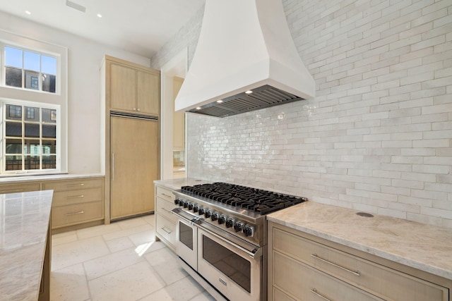 342 Windsong Dr, Inlet Beach, FL 32461 - kitchen featuring premium range hood, backsplash, high end appliances, light stone countertops, and light brown cabinets