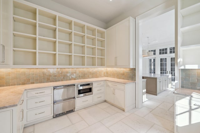 342 Windsong Dr, Inlet Beach, FL 32461 - kitchen with refrigerator, open shelves, stone tile floors, and tasteful backsplash