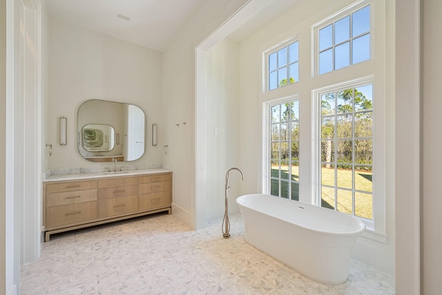 342 Windsong Dr, Inlet Beach, FL 32461 - bathroom with a soaking tub and vanity