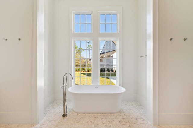 342 Windsong Dr, Inlet Beach, FL 32461 - bathroom featuring baseboards and a soaking tub