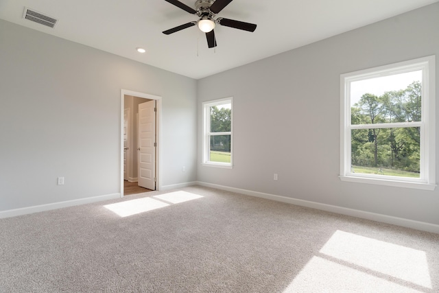 6119 Tansey St, Crestview, FL 32539 - unfurnished room featuring baseboards, a ceiling fan, and light colored carpet