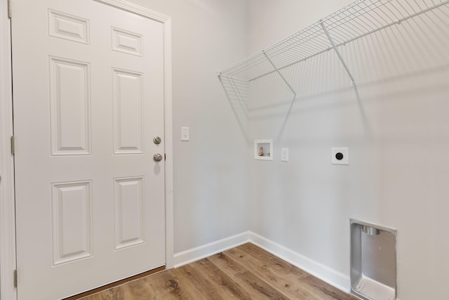 6119 Tansey St, Crestview, FL 32539 - laundry room with hookup for a washing machine, hookup for an electric dryer, baseboards, and wood finished floors