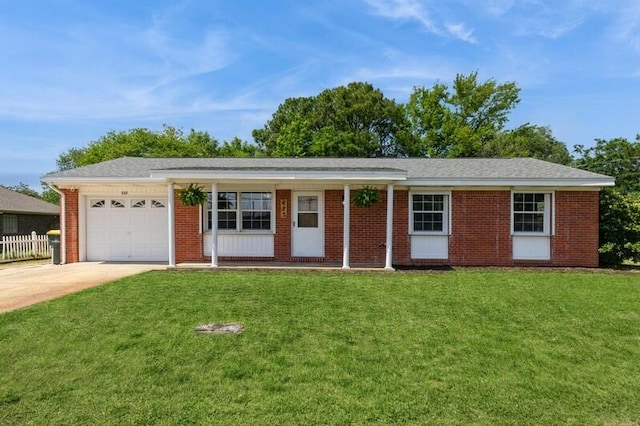 217 NW Martisa Rd, Fort Walton Beach, FL 32548 - ranch-style house featuring driveway, an attached garage, a front lawn, and brick siding