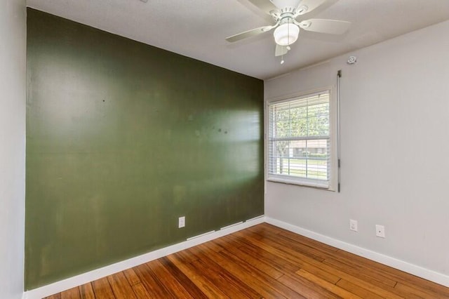 217 NW Martisa Rd, Fort Walton Beach, FL 32548 - unfurnished room featuring baseboards, wood finished floors, and ceiling fan