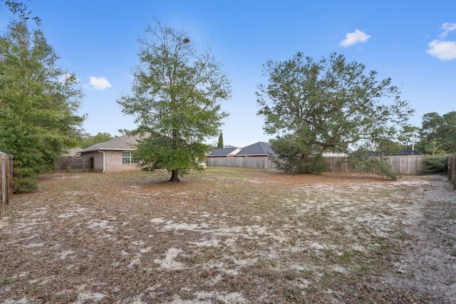 view of yard featuring fence