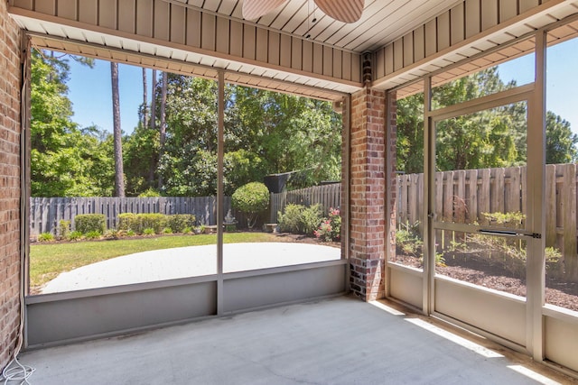 256 Cocobolo Dr, Santa Rosa Beach, FL 32459 - unfurnished sunroom with a ceiling fan and a wealth of natural light