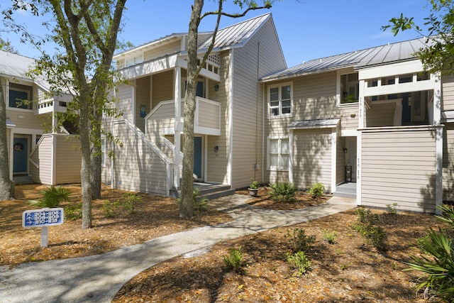 9815 W US Highway 98 Unit 215, Miramar Beach, FL 32550 - view of front of property featuring metal roof and a standing seam roof