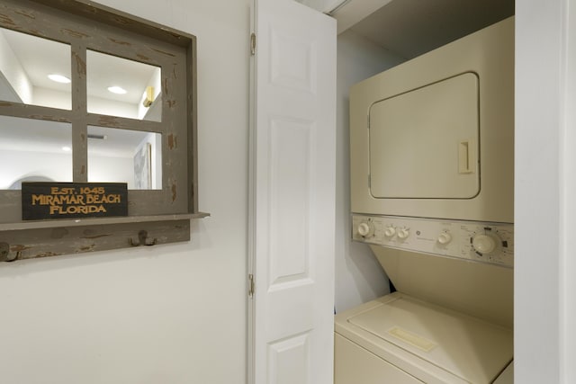 9815 W US Highway 98 Unit 215, Miramar Beach, FL 32550 - clothes washing area with laundry area and stacked washer and clothes dryer