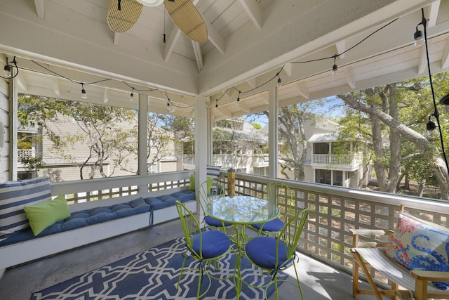 9815 W US Highway 98 Unit 215, Miramar Beach, FL 32550 - sunroom featuring ceiling fan and beam ceiling