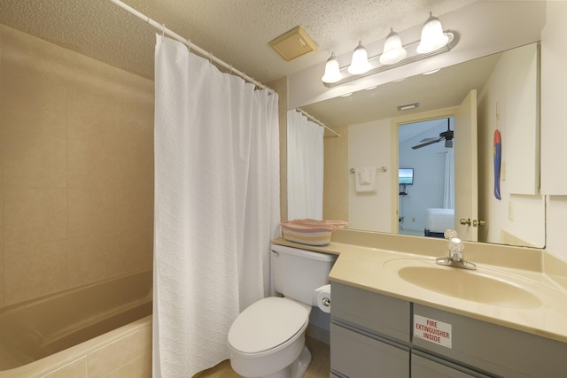 9815 W US Highway 98 Unit 215, Miramar Beach, FL 32550 - full bath featuring shower / bath combination with curtain, toilet, vanity, and a textured ceiling