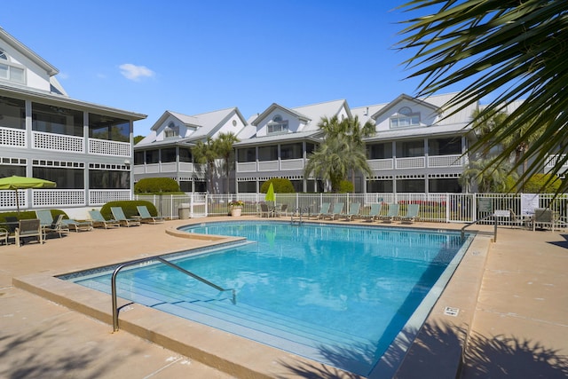 9815 W US Highway 98 Unit 215, Miramar Beach, FL 32550 - community pool featuring a sunroom, a patio, and fence