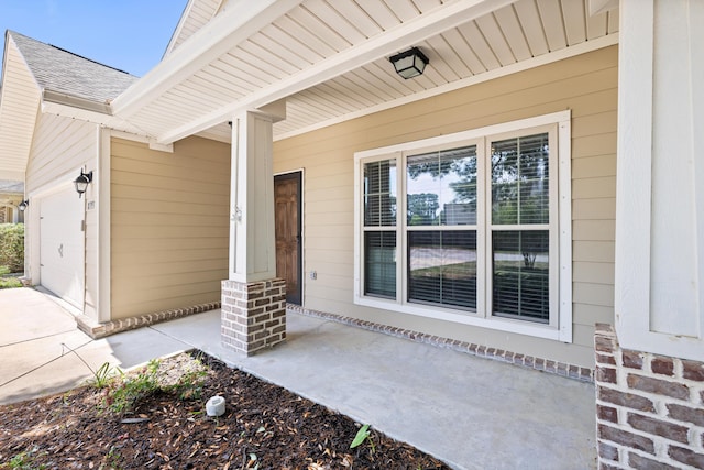 8393 New Orleans Ct, Navarre, FL 32566 - entrance to property with an attached garage and covered porch