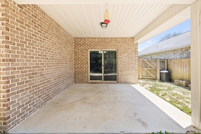 8393 New Orleans Ct, Navarre, FL 32566 - view of patio with a gate