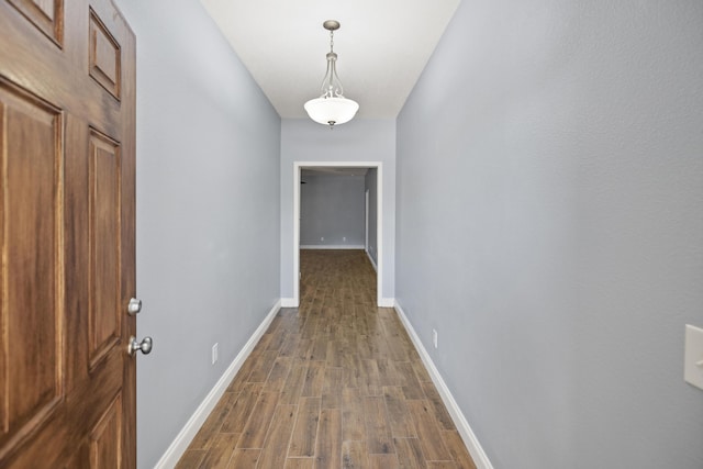 8393 New Orleans Ct, Navarre, FL 32566 - corridor featuring dark wood-type flooring and baseboards