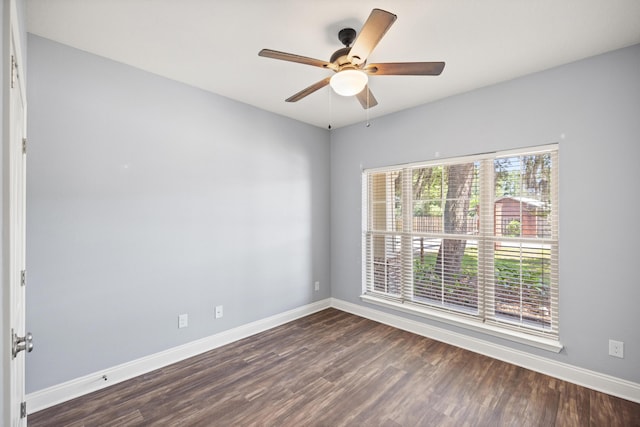 8393 New Orleans Ct, Navarre, FL 32566 - unfurnished room with dark wood-type flooring, baseboards, and ceiling fan