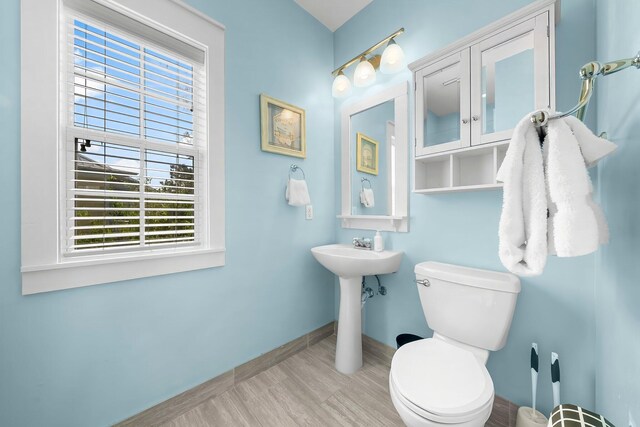 198 Somerset Bridge Rd Unit 117, Santa Rosa Beach, FL 32459 - half bath with baseboards and toilet