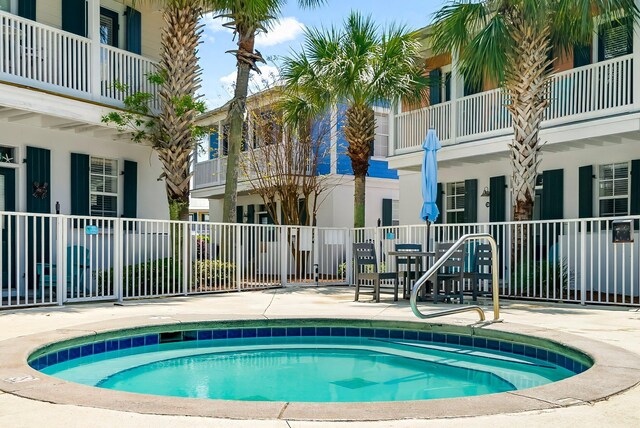 198 Somerset Bridge Rd Unit 117, Santa Rosa Beach, FL 32459 - view of swimming pool with a patio and fence