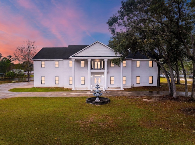 680 Mallet Bayou Rd, Freeport, FL 32439 - view of front of house with a front lawn