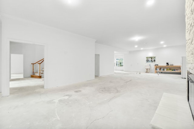 680 Mallet Bayou Rd, Freeport, FL 32439 - living area featuring stairs and unfinished concrete floors