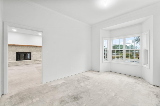 680 Mallet Bayou Rd, Freeport, FL 32439 - empty room featuring a fireplace and ornamental molding