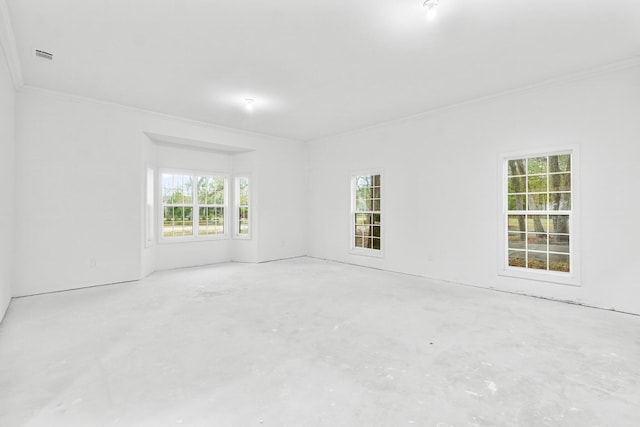 680 Mallet Bayou Rd, Freeport, FL 32439 - spare room featuring concrete flooring, ornamental molding, and visible vents