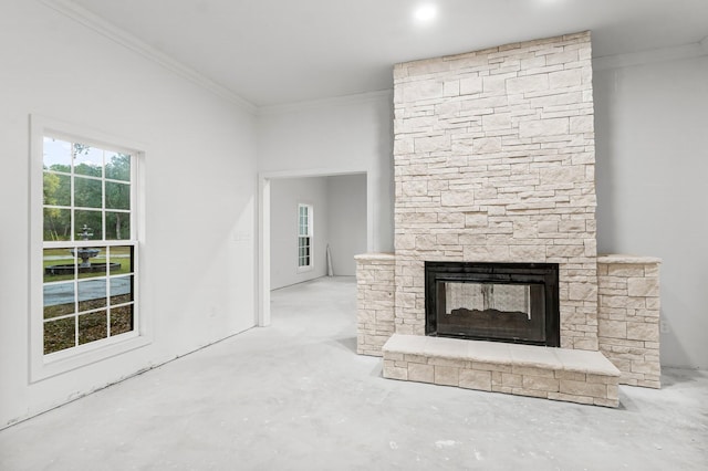 680 Mallet Bayou Rd, Freeport, FL 32439 - unfurnished living room with unfinished concrete flooring, ornamental molding, and a fireplace