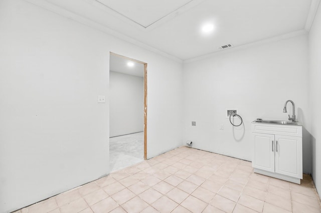 680 Mallet Bayou Rd, Freeport, FL 32439 - clothes washing area with crown molding, a sink, visible vents, cabinet space, and hookup for a washing machine