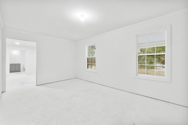 680 Mallet Bayou Rd, Freeport, FL 32439 - unfurnished room with crown molding and plenty of natural light