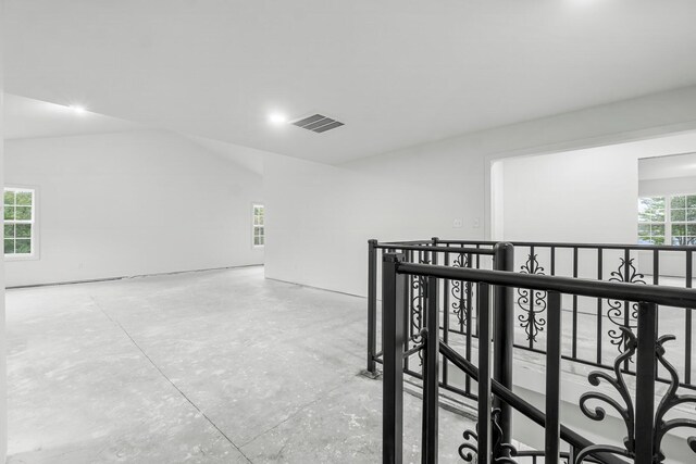 680 Mallet Bayou Rd, Freeport, FL 32439 - hall featuring concrete flooring, an upstairs landing, and visible vents