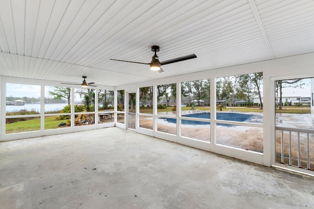680 Mallet Bayou Rd, Freeport, FL 32439 - unfurnished sunroom with a water view and a ceiling fan