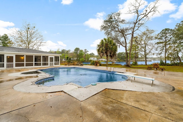 680 Mallet Bayou Rd, Freeport, FL 32439 - outdoor pool featuring a patio, a sunroom, and a water view