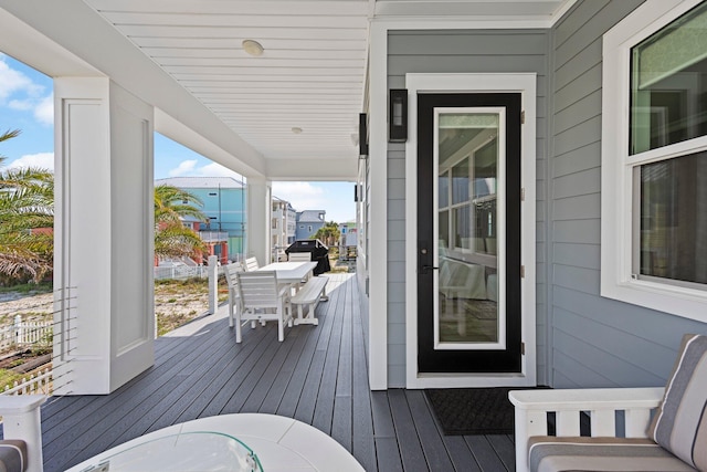 wooden deck with area for grilling